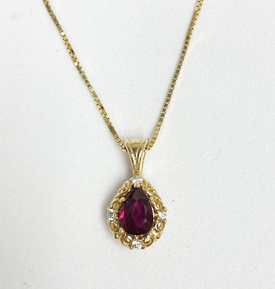 14 Karat Yellow Ruby Pendant