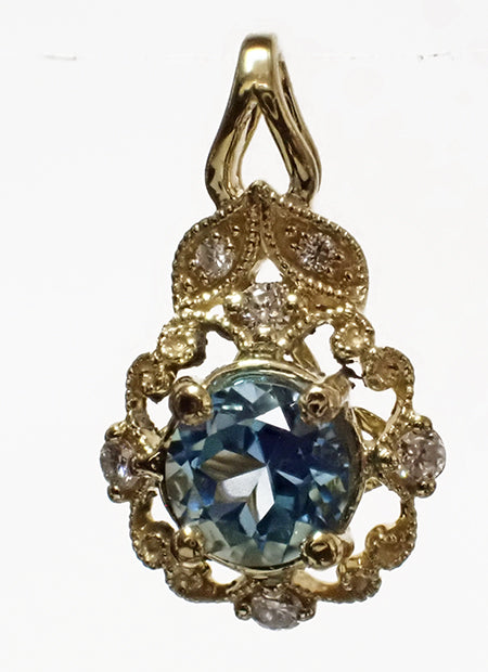 18 Karat Yellow Blue Topaz Pendant